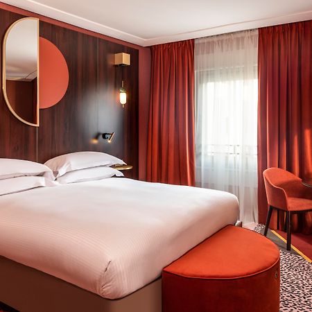 Nest Paris La Defense - Mgallery Puteaux Bagian luar foto A room at the hotel