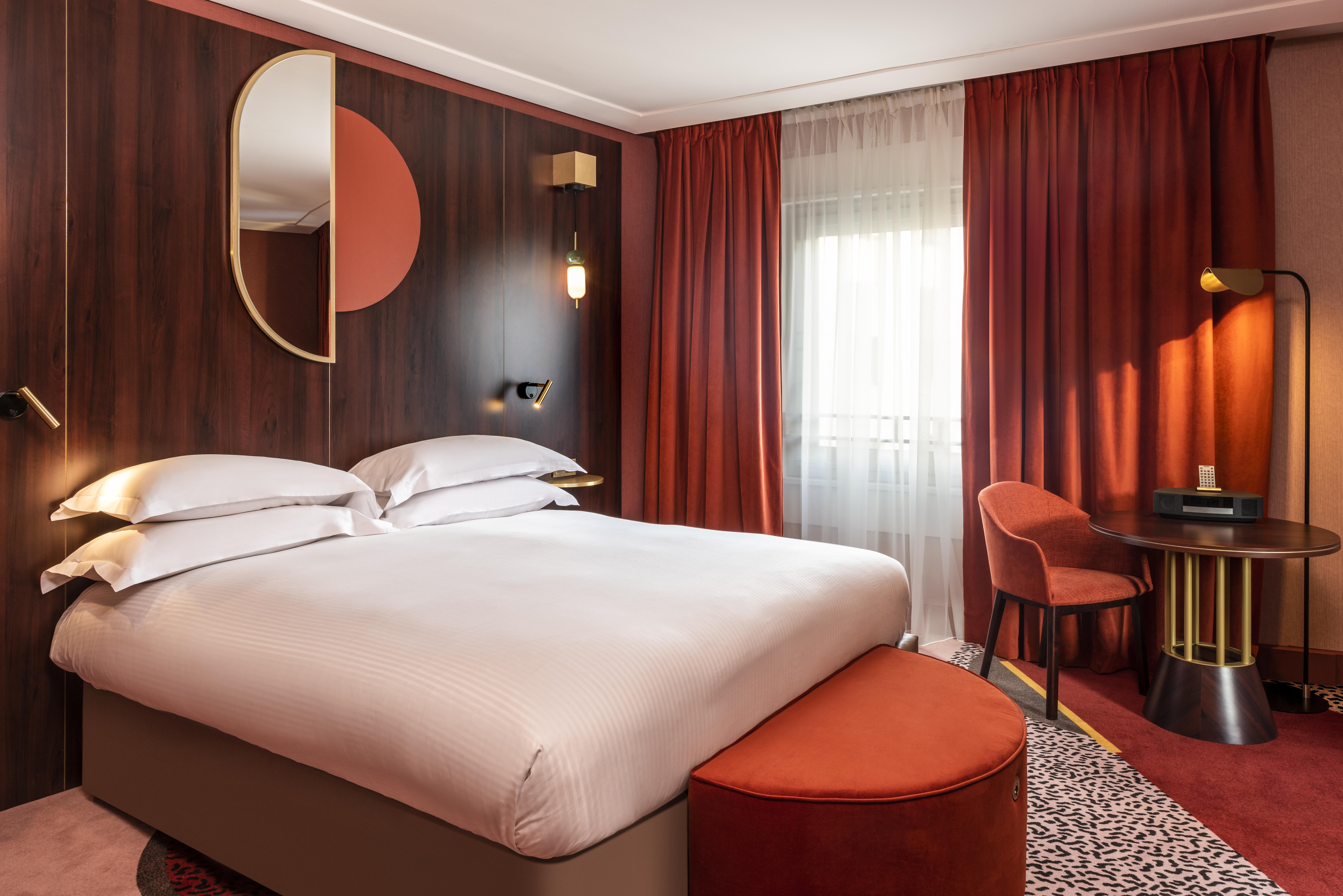 Nest Paris La Defense - Mgallery Puteaux Bagian luar foto A room at the hotel