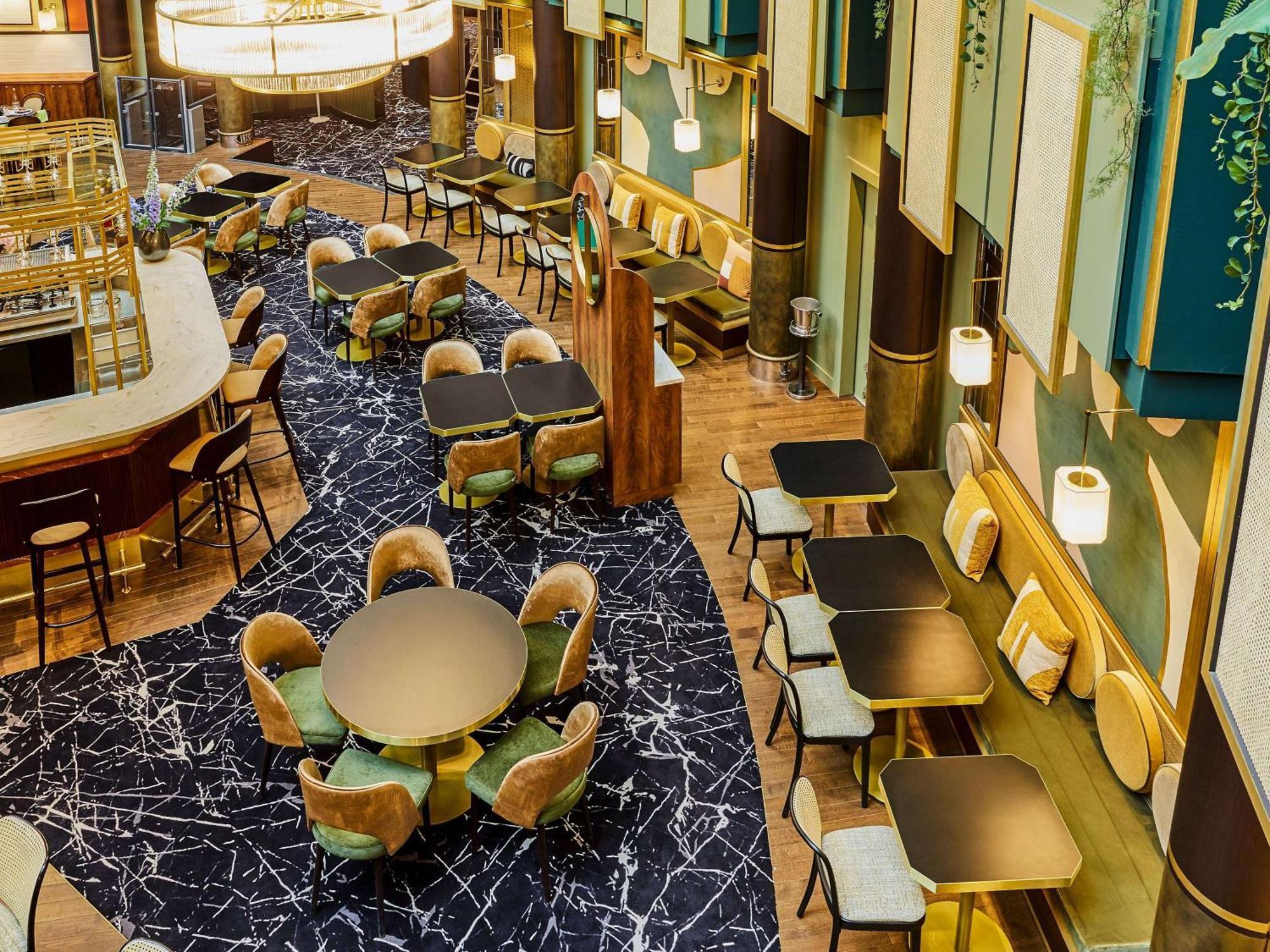 Nest Paris La Defense - Mgallery Puteaux Bagian luar foto The interior of the restaurant