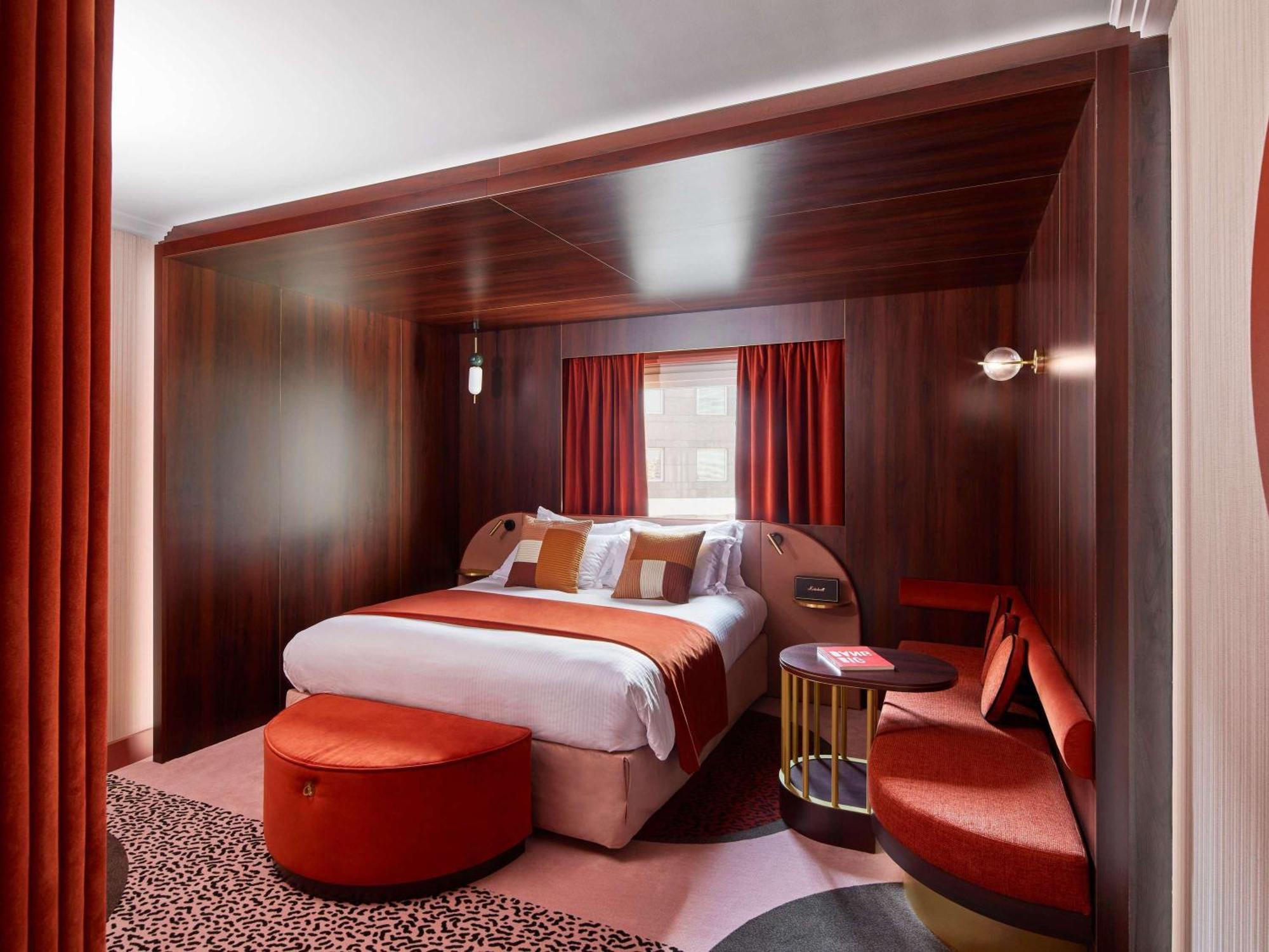 Nest Paris La Defense - Mgallery Puteaux Bagian luar foto A room at the hotel